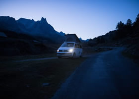 A rental van at night