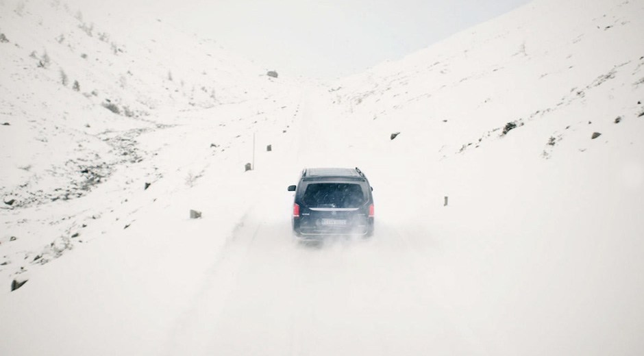 A 9-passenger minibus in the snow