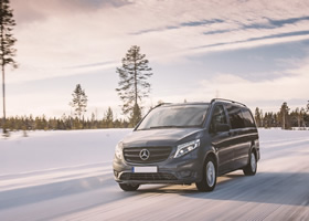 A 9-passenger Mercedes minibus on the road