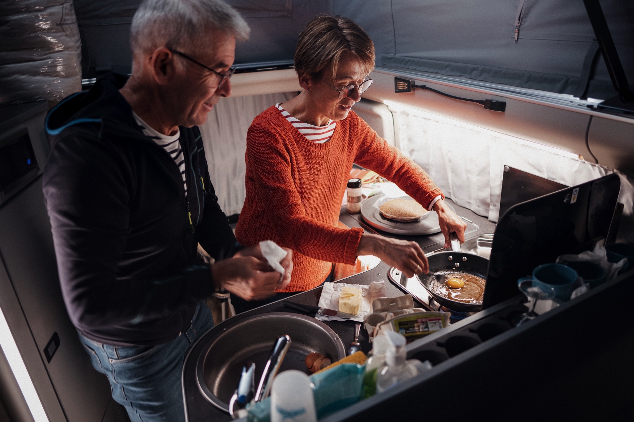 Kitchen activity in a campervan